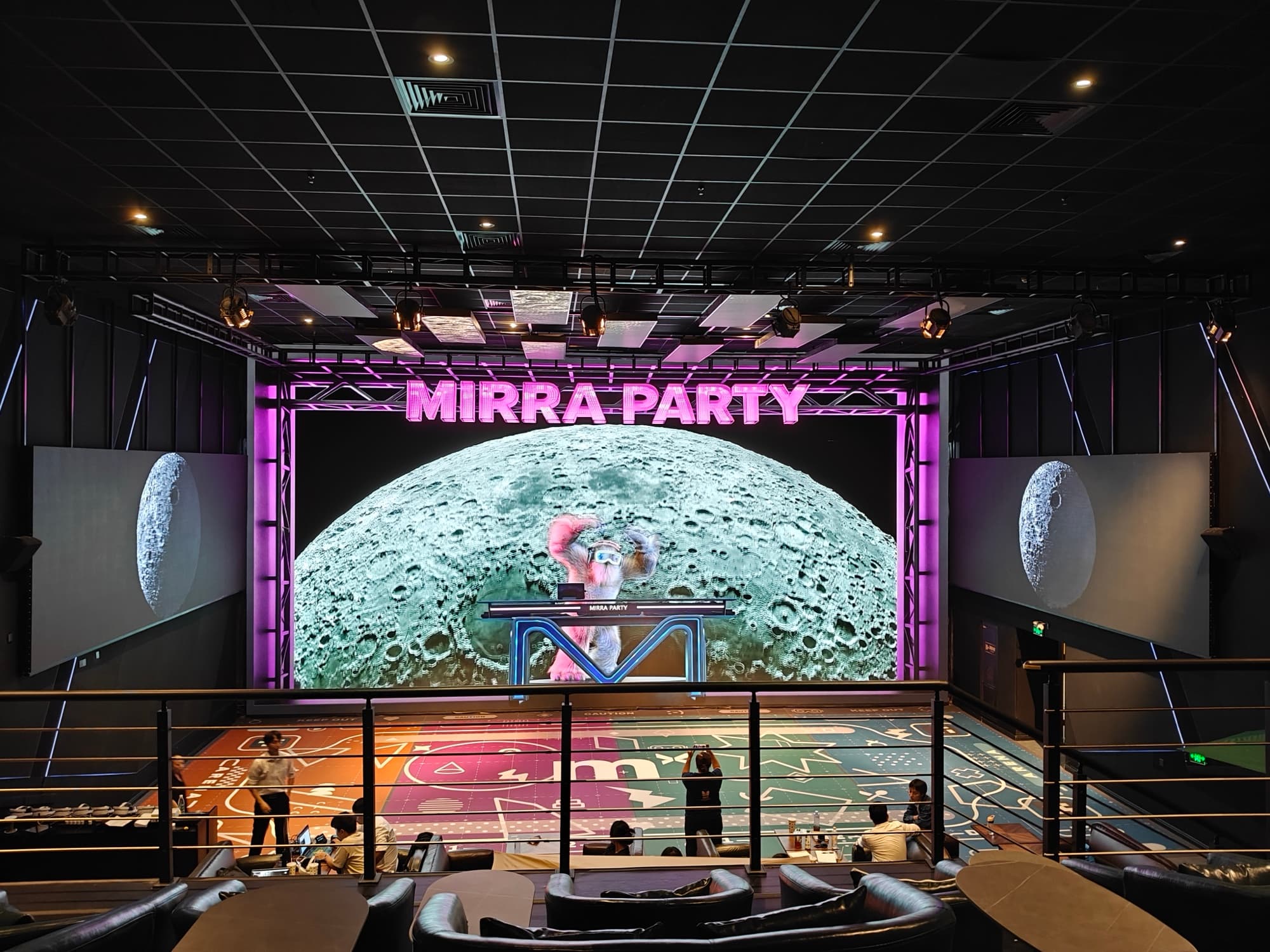 Large live display beside the MirraArena game floor