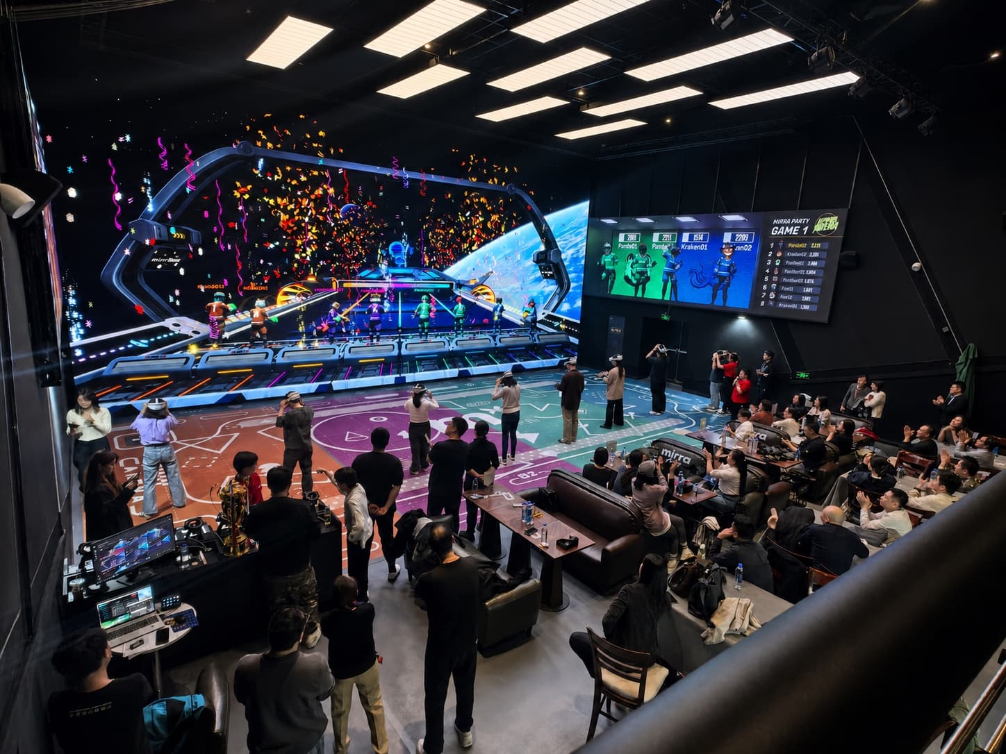 Players compete inside MirraArena at the Wukesong location of Sparkle Roll-Jackie Chan Cinema while spectators follow the action on the large-format screens.